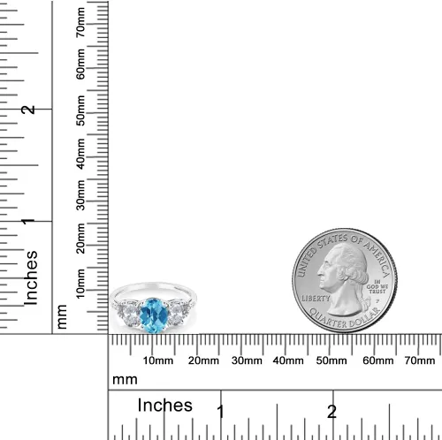 Vista 46 de Anillo de compromiso ovalado de oro blanco de 10 quilates con piedra natal y topacio blanco de 3 piedras con detalles de diamante Centro de 0.315