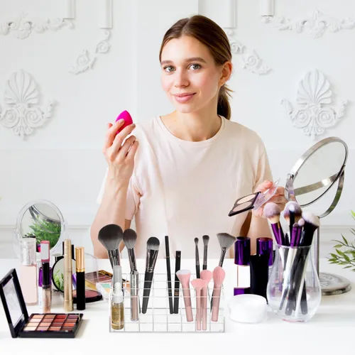 Vista 9 de FOMIYES Soporte para lápiz labial de 24 ranuras, organizador de maquillaje acrílico transparente para encimera, tocador y baño, estante