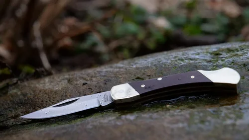 Vista 5 de Uncle Henry LB3 Brown Bear - Cuchillo plegable de acero inoxidable de alto carbono de 5.1 pulgadas con hoja de punta de clip de 2.2 pulgadas y mango