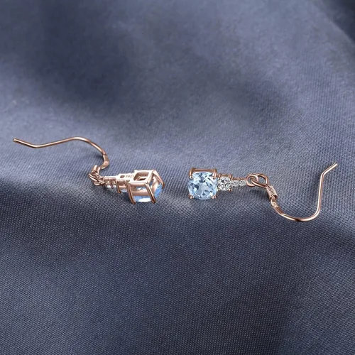 Vista 5 de JewelryPalace Aretes colgantes de topacio azul cielo genuino de 1.5 quilates para mujer, chapados en oro rosa blanco amarillo de 14 quilates, aretes