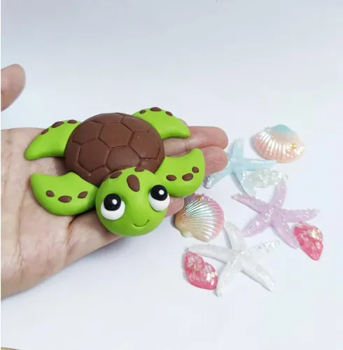 Vista 2 de Decoración para pastel de tortuga bebé, conchas de mar, conchas de estrella para tema de mar oceánico