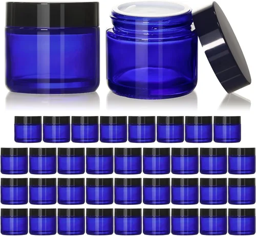 Vista 8 de KEYWING Tarros de vidrio ámbar de 1 oz con tapas negras, paquete de 36 tarros pequeños redondos de vidrio para cosméticos con forros interiores