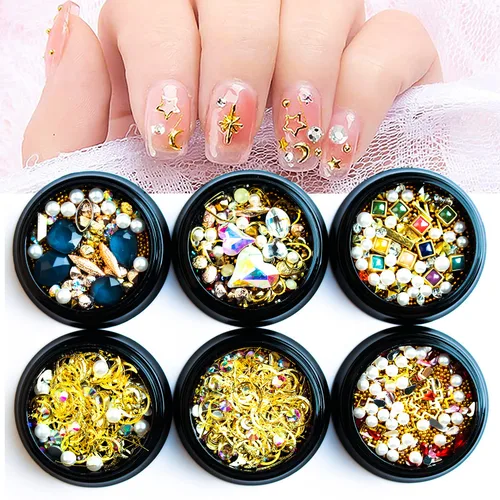 Vista 2 de 6 cajas de dijes de uñas 3D dorados, dijes de arte de uñas con parte trasera plana, joyas de diamantes de imitación para uñas, gemas de uñas