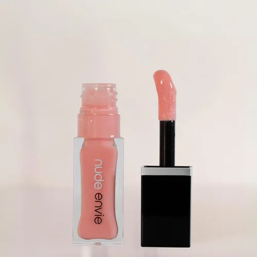 Vista 18 de nude envie - Brillo de labios - Acabado de alto brillo - Hidratante y fácil aplicación - Hidratación de lujo - Fórmula antiadherente - Con vitamina