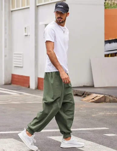 Vista 2 de COOFANDY Pantalones de harén hippie para hombre, holgados, de lino, bohemio, para yoga, casual, con entrepierna caída, pantalones