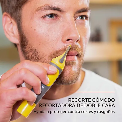 Vista 4 de Remington NE3871 - Recortadora de nariz, orejas y cejas prácticamente indestructible, color amarillo