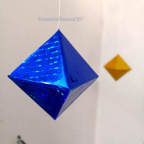 Vista 5 de Láser brillante octaédrico móvil bebé juguete brillante y brillante Montessori móvil con materiales respetuosos con el medio ambiente del bebé