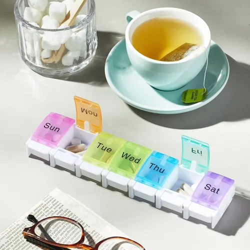 Vista 4 de Organizador semanal de pastillas de 7 días con diseño abierto de primavera y grandes compartimentos para contener medicamentos, vitaminas