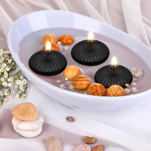 Vista 2 de Paquete de 12 velas flotantes negras de 3 pulgadas, velas sin perfume de 10 horas sin goteo para jarrones cilíndricos, centros de mesa en bodas