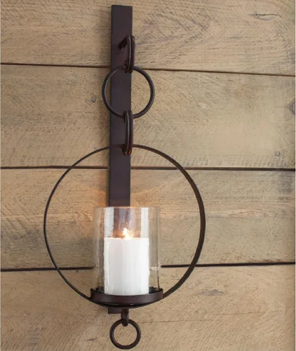 Vista 2 de Signature Design by Ashley - Aplique de pared con velas de gran tamaño, decoración en tono bronce Clear glass hurricane, Bronze-tone metal wall