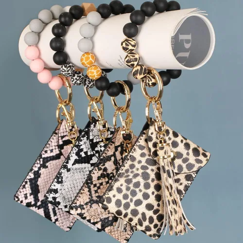 Vista 7 de UpUDo Llavero pulsera de silicona, pulsera con cuentas de silicona con cartera para tarjetas, llavero elástico para mujer