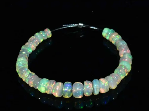 Vista 2 de AARZU GEMS 3-4.5 MM Natural etíope Welo Fire Opal Rondelle Perlas 3 "1 hebra ópalo