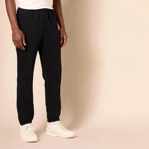 Vista 2 de Tienda Essentials Pantalones deportivos para hombre, forro polar, parte inferior cerrada (disponible en tallas grandes y altas)