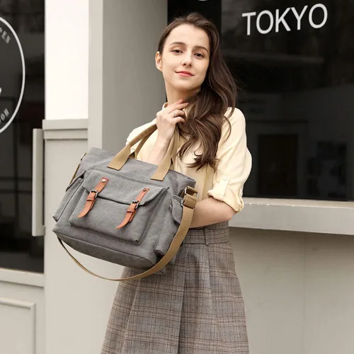 Vista 2 de Bolso bandolera de lona estilo vintage con bolsillos, unisex, tamaño mediano