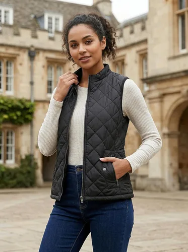 Vista 2 de Fuinloth Women's Quilted Vest Lightweight Puffer Stand Collar Zip Gilet Negro