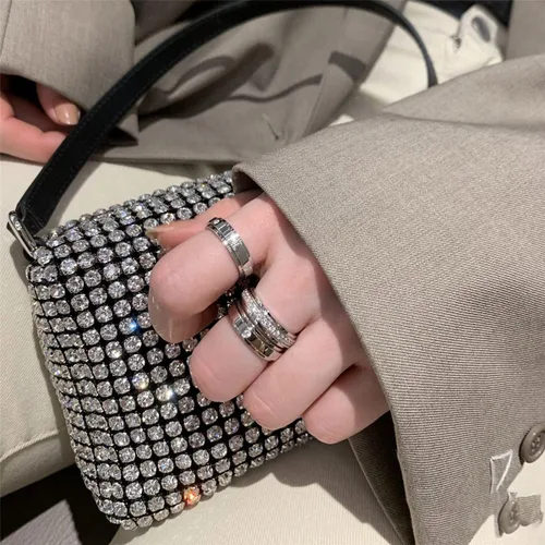 Vista 5 de Nylry Anillos giratorios de acero inoxidable de titanio con piedras de circonita cúbica anillos de ansiedad para mujeres y hombres anillo de promesa