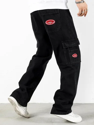 Vista 2 de OYOANGLE Pantalones de mezclilla holgados para hombre pierna recta con solapa bolsillo