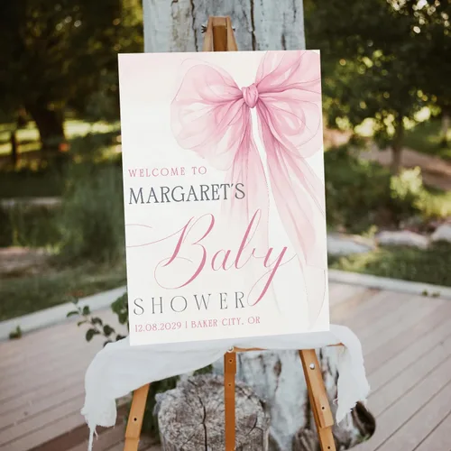 Vista 5 de Letrero personalizado de bienvenida al baby shower, con lazo rosa con decoración elegante, espacio acogedor, ideas creativas y momentos alegres