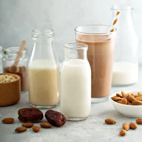 Vista 4 de QAPPDA Botellas de vidrio de 12 onzas, botellas de leche de vidrio Tapa negra