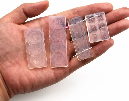 Vista 3 de Paquete de 10 moldes de silicona para arte de uñas, moldes decorativos de resina, plantillas de arte de uñas, herramienta de curación principal