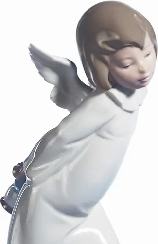 Vista 2 de LLADRÓ Figura de ángel curioso. Figura de ángel de porcelana.