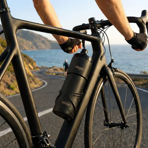 Vista 2 de THE CLEAN HYDRATION COMPANY - Botella de agua deportiva de 20 onzas, botella de agua aislada para bicicleta con boquilla fácil de limpiar, fácil