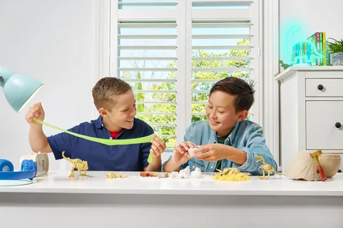 Vista 5 de Robo Alive ZURU - Mini Dino Fossil Find (paquete de 2, gigantoraptor y estegosaurio) para niños de 5 años en adelante, excavar y descubrir, STEM