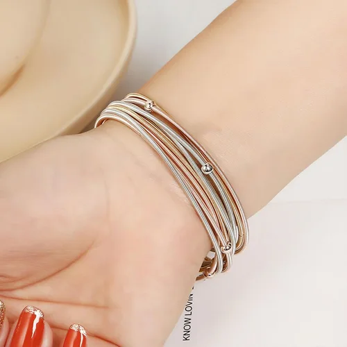 Vista 2 de YANCHUN 10 pulseras de cuerda de guitarra para mujer, pulseras de hilo en capas, pulseras elásticas plateadas, pulseras de oro, joyería