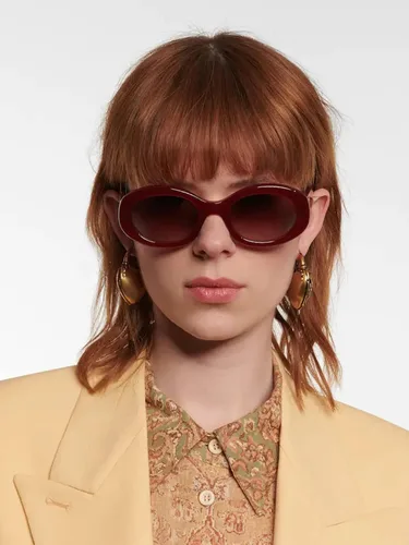 Vista 2 de PORADAY Lentes de sol ovalados modernos y gruesos para mujer, lentes de sol retro estrechos y gruesos, tonos degradados, redondos