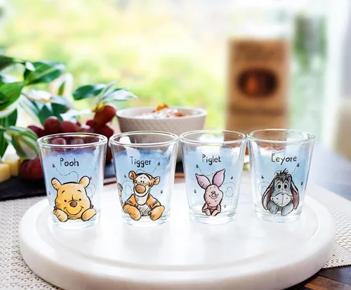 Vista 2 de Silver Buffalo Winnie the Pooh Faces - Juego de 4 mini vasos de 1.5 onzas
