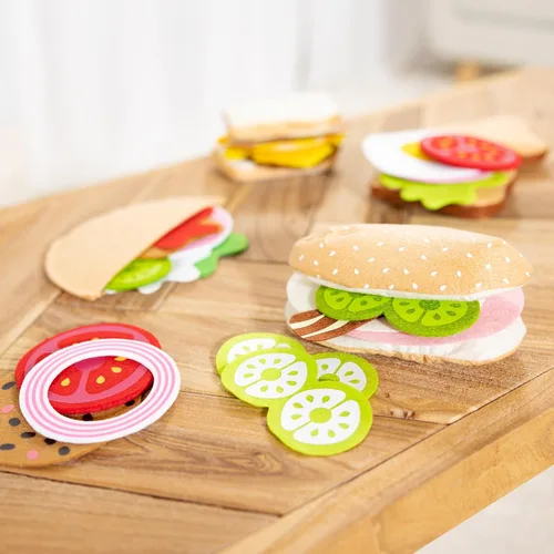 Vista 9 de Melissa & Doug alimentos de fieltro, set de juego para preparar sandwich, 33 piezas.