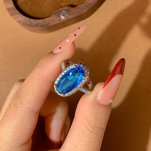Vista 7 de YUANYI Anillo de compromiso de aniversario con topacio azul ovalado de moda vintage chapado en platino