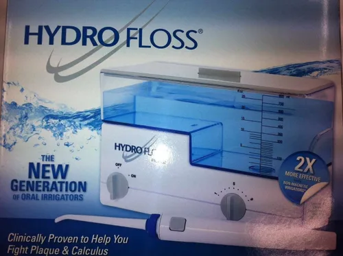 Vista 2 de Hydro Floss - Irrigador Oral Plus Paquete de Libro - 2 Artículos