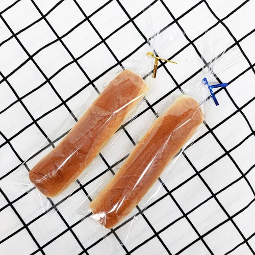 Vista 4 de 100 bolsas de celofán de 3 x 11 pulgadas, bolsas transparentes para dulces con lazos giratorios de 4 pulgadas, bolsas de plástico para violonchelo