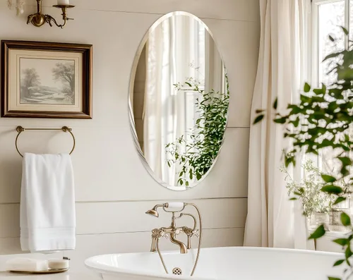 Vista 3 de Espejo de pared ovalado sin marco: Espejo decorativo elíptico de vidrio espejado para tocador con borde plateado biselado para baño, dormitorio