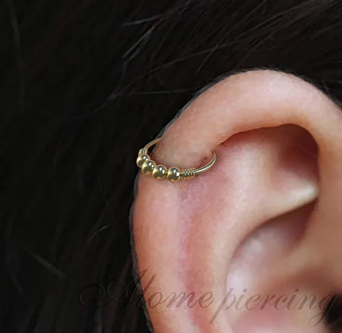 Vista 34 de Variedad de aretes de aro para cartílago