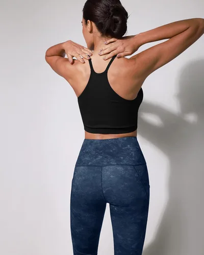 Vista 5 de ODODOS - Leggings capri de cintura alta, con bolsillos, control de abdomen, para mujer, no se transparentan, para yoga, entrenamiento, deportes