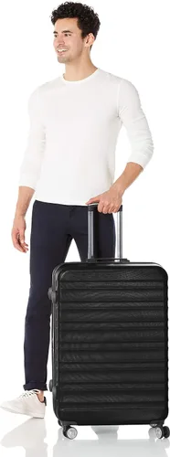 Vista 2 de Tienda Basics Maleta giratoria rígida con ruedas, Negro, Juego de 2 piezas (20 pulgadas, 28 pulgadas)