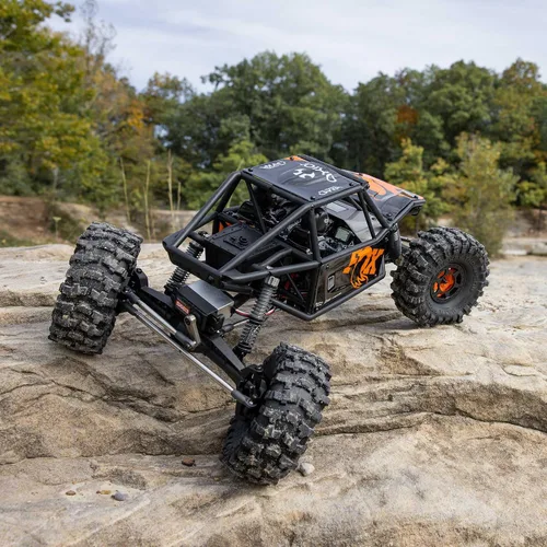 Vista 4 de Axial RC Crawler 1/10 UTB10 Capra 1.9 4WS 4X4 RTR Crawler de roca con cepillo, naranja, AXI-1543T1