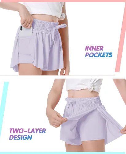 Vista 2 de QooNoo Pantalones cortos de mariposa para niñas con bolsillo, pantalones cortos atléticos fluidos de cintura alta para correr para niños