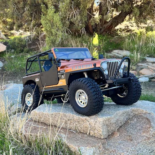 Vista 6 de Axial 1/10 SCX10 III Jeep CJ-7 4X4 RTR cepillado RC Rock Crawler, cobre