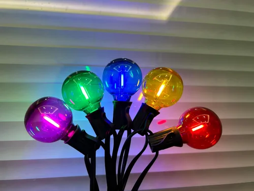 Vista 3 de Paquete de 25 bombillas LED multicolor G40 de repuesto de Navidad, 1 vatio, base de candelabro E12/C7, bombillas LED Edison inastillables