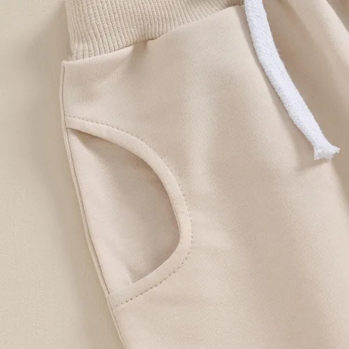 Vista 6 de Mubineo Pantalones deportivos básicos lisos para bebés, niños y niñas, cómodos pantalones de algodón con bolsillos