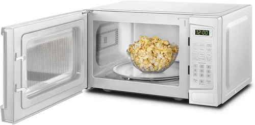 Vista 4 de Danby DBMW1120BWW - Microondas para encimera de 1.1 pies cúbicos en blanco, 1000 vatios, microondas de tamaño familiar con puerta de botón