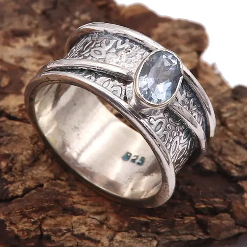 Vista 5 de Goyal Exports SRG328A - Anillo giratorio de plata de ley 925 con topacio azul