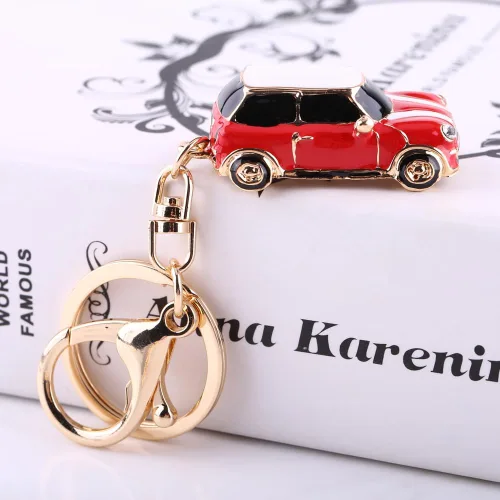 Vista 3 de TOPINCN Alloy Classic 3D Hollow Carved Simulation Mini Sporty Car Key Chain Bag Charm Pendant (Red)