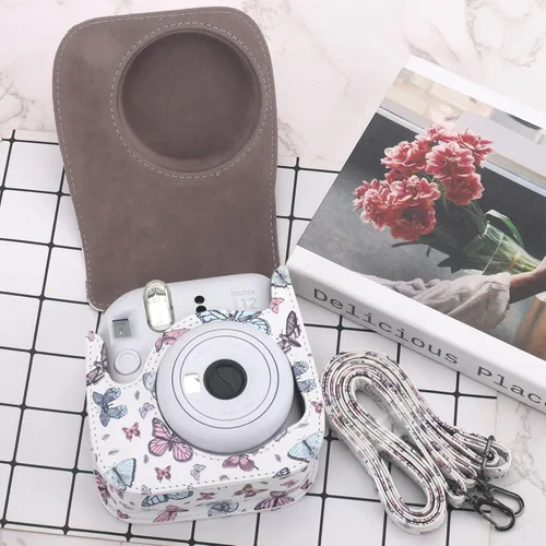 Vista 6 de Funda Protectora Compatible con Cámara de Fotos Instantáneas Fujifilm Instax Mini 12 11 9 8 con Bolsillo y Correa Ajustable (Mariposa Grande Pequeña)