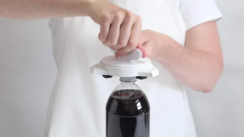 Vista 3 de KUHN RIKON Abridor de agarre sin esfuerzo para frascos y botellas, 10 x 5 x 2.25 pulgadas, blanco