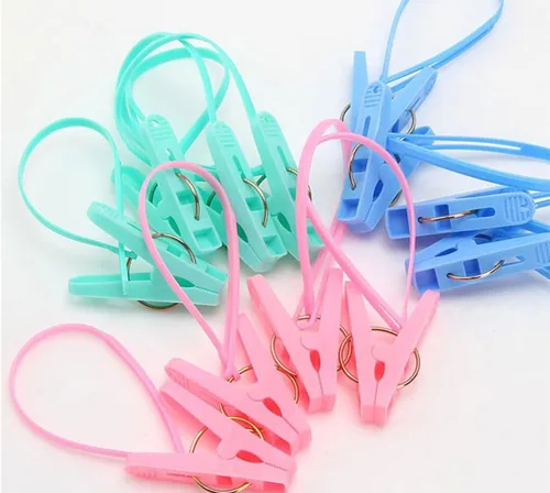 Vista 4 de 12 pinzas de clip para ropa, clip de cuerda multicolor, línea de ropa para colgar, resistente al viento, para colgar calcetines, clavija de secado