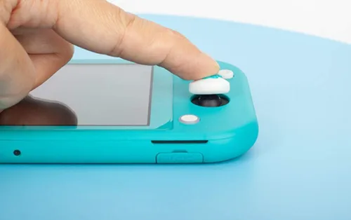 Vista 3 de Tapas de silicona para el pulgar con diseño ergonómico, color verde y verde